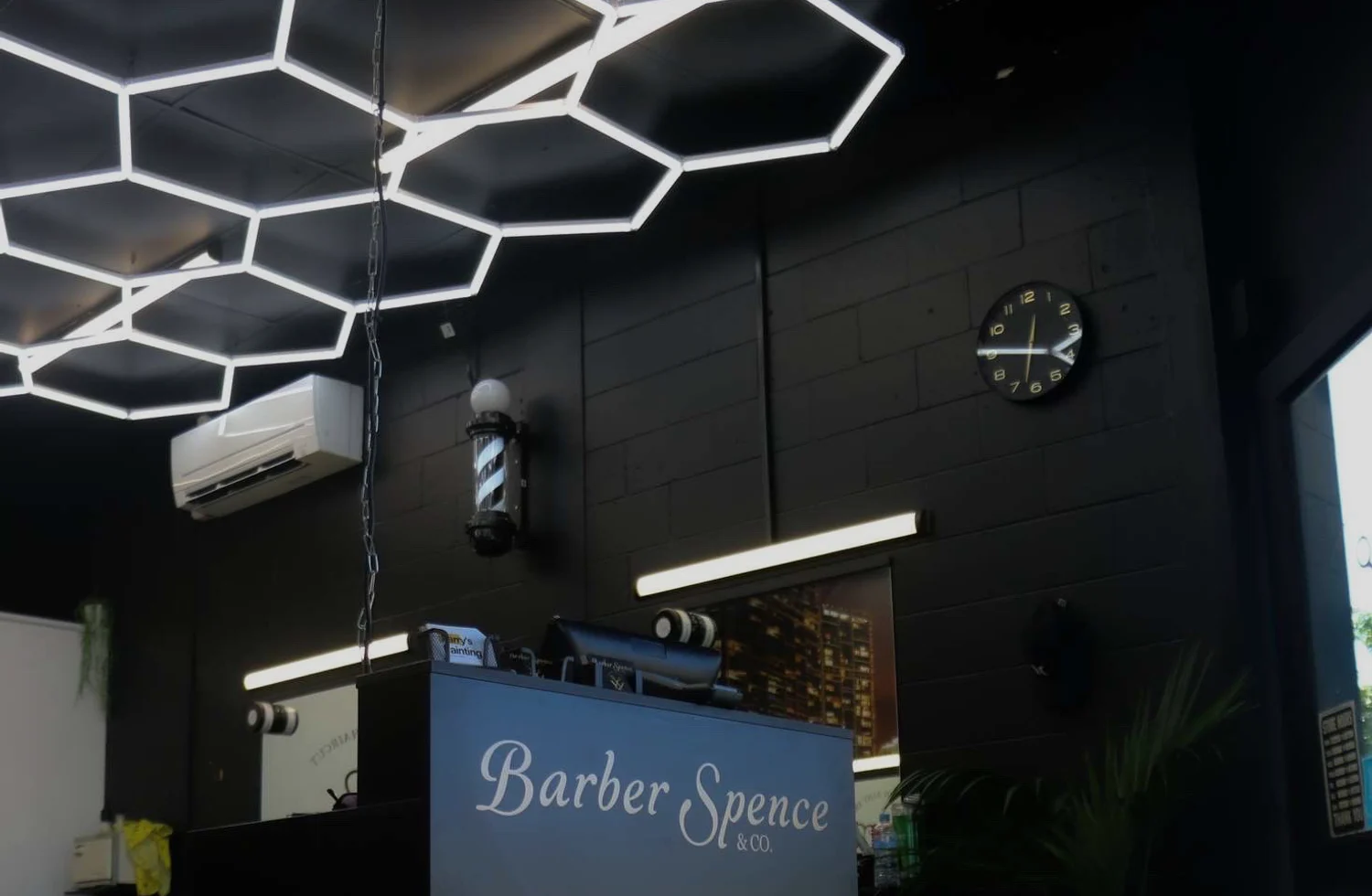 The Barber Spence shop interior with its illuminated hexagonal ceiling